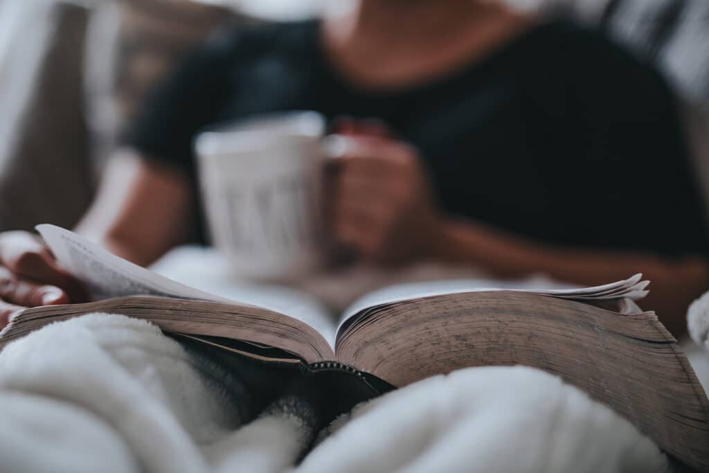 reading a book with coffee